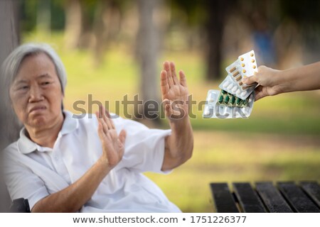 Foto stock: Anti Drug Concept And Hand Giving Pills