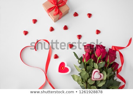 ストックフォト: Close Up Of Red Roses Gift Candies And Candle