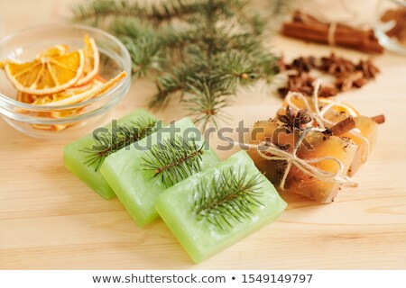 Foto d'archivio: Fresh Handmade Soap Bars Scented By Conifer And Aromatic Spices On Table