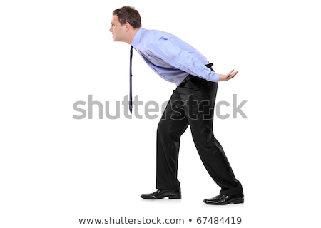 [[stock_photo]]: Portrait Of A Businessman Carrying Something Heavy Against A White Background