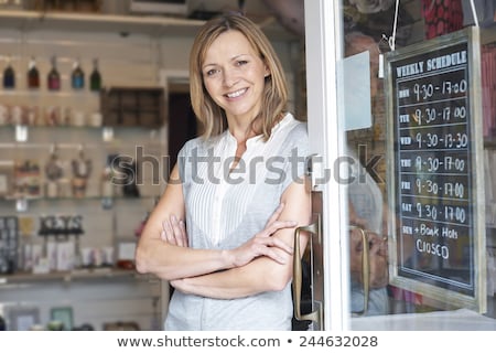 Stock photo: Owner Of Gift Shop Standing In Doorway