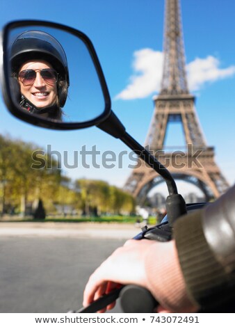 Foto stock: Woman On Moped In Paris