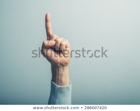 Stockfoto: Human Hand With Index Finger Pointing Up