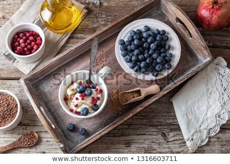 Foto stock: Cottage Cheese With Ground Flax Seeds And Blueberries