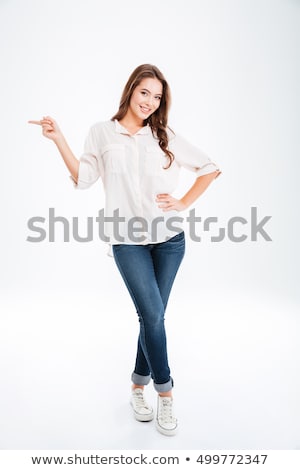 Stockfoto: Full Length Of An Excited Young Woman