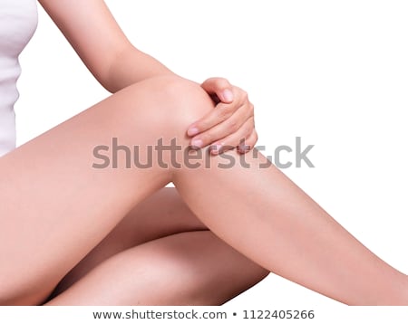 ストックフォト: Long Woman Legs With Beautiful Smooth Skin Closeup Of Female Hand Touching Perfect Hairless Soft An