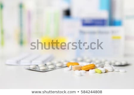 ストックフォト: Colorful Medical Tablets And Pills On Doctors Office Desk