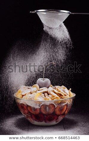 Stockfoto: Dark Perfect Refined Dessert With Ripe Cherry And Wave Falling Powdered Sugar