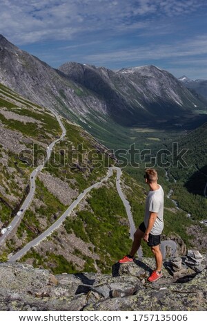 Foto stock: Mountain Hiker At High Viewpoint Looking At The Valley