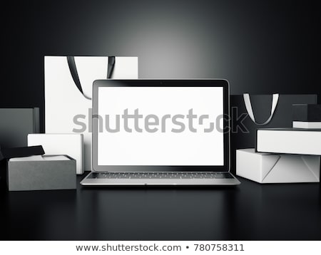 Stock photo: Modern Laptop With A Lot Of Gift Packages And Bags 3d Rendering