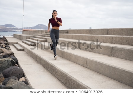 Stock fotó: Active Young Beautiful Woman Running On The Promenade Along The