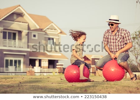 Сток-фото: Kids Playing With Inflatable Ball Children Nature