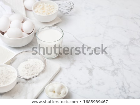 Stock photo: Fresh Dairy Products On White Table Background Glass Of Milk Bowl Of Flour And Cottage Cheese And