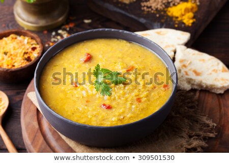 Foto stock: Red Lentil Indian Soup With Flat Bread Masoor Dal