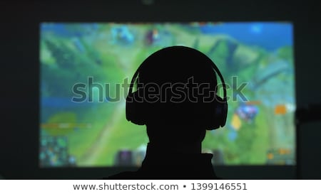 Сток-фото: Hands Of Young Gamer Man Playing Video Games On Computer In Dark