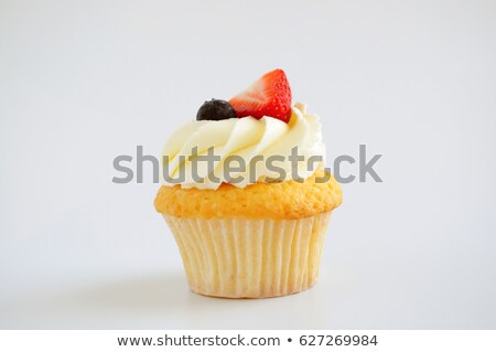 ストックフォト: Cupcake With Whipped Cream And Strawberry
