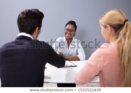 Foto stock: Couple At Interview At Adoption Agency
