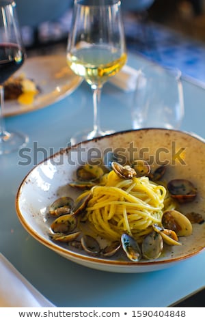 Stock photo: Chef Plating Up Seafood Pasta