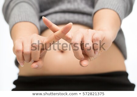 Foto d'archivio: Pregnant Woman Breaking A Cigarette In Two