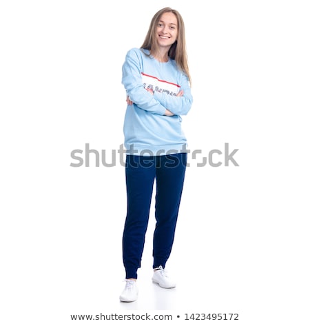 Stock fotó: Young Woman On Tracksuit Watching From Behind