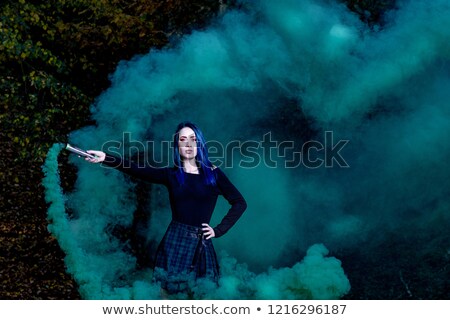 Girl With Blue Dark Smoke [[stock_photo]] © fotoduki