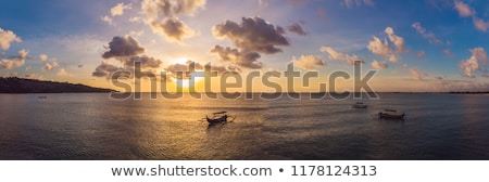 Zdjęcia stock: Traditional Balinese Boat Jukung At Jimbaran Beach At Sunset In Bali Indonesia Photo From The Drone