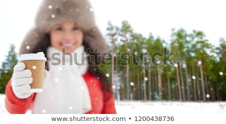 ストックフォト: Woman In Fur Hat With Coffee Over Winter Forest