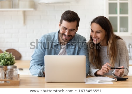 Foto stock: Young Woman Wife In Budget Planning Concept