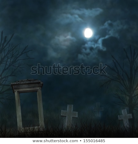 Zdjęcia stock: Spooky Halloween Graveyard With Dark Clouds And Ominous Moon
