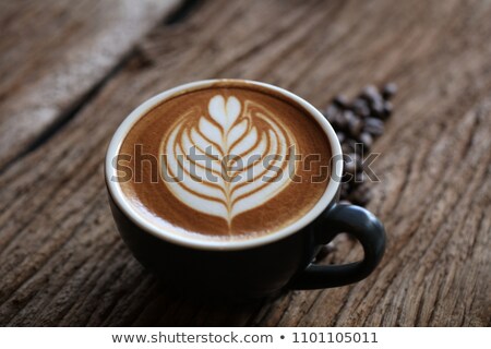 Stockfoto: Cup Of Latte On Wood Table