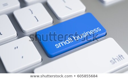 Foto d'archivio: Keyboard With Blue Key - Small Business Solutions