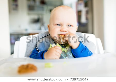 Stock photo: Baby Boy Eating With Blw Method Baby Led Weaning