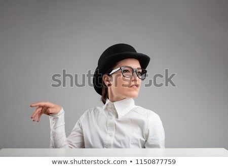 Stock fotó: Elegant Diva In A Vintage Bowler Hat And Glasses