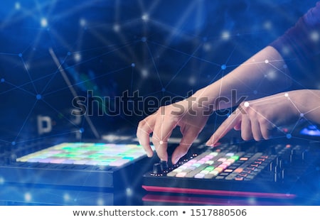 Stock foto: Hand Mixing Music On Midi Controller With Connectivity Concept