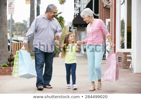 Stockfoto: Urban Walk In City Grandmother And Grandfather