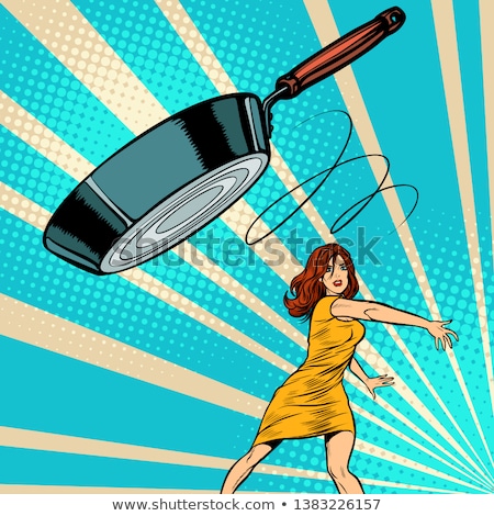 Stock photo: Woman Throws A Frying Pan