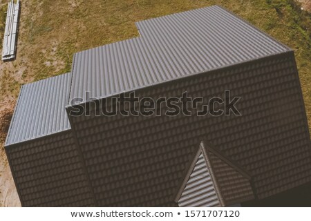 Imagine de stoc: House Facade With Gable And Roof Pattern