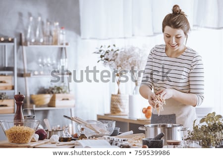 Stok fotoğraf: Woman Cooking Pizza