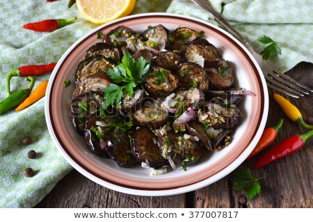 [[stock_photo]]: Marinated Aubergine Stuffed With Red Pepper