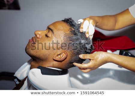 Stock fotó: Hair Stylist Washing Mans Hair