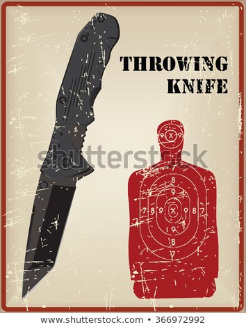 Foto stock: Tactical Knife And A Target For Throwing Knife