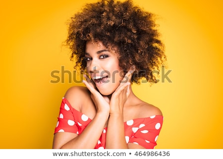 [[stock_photo]]: Fashionable Girl With Afro Hairstyle Posing