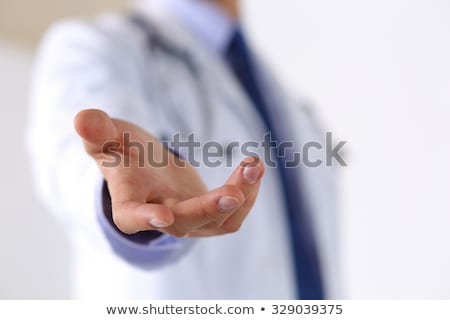 Imagine de stoc: Male Doctor Giving Helping Hand