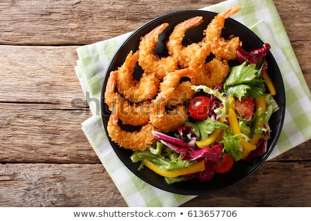 Foto stock: Seafood Salad With Vegetables And Shrimps On The Wooden Table