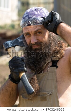 Stockfoto: Lumberjack Beard And Ax