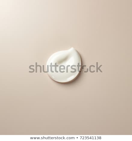 Foto stock: Beauty Concept Young Woman With Drops Of Cream