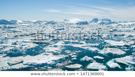 Foto stock: Icebergs From Melting Glacier In Icefjord - Global Warming And Climate Change