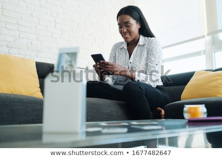 Сток-фото: Black Woman Using Portable Wi Fi Printer For Printing Pictures