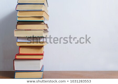 Сток-фото: Isolated Books Heap Against The White Background