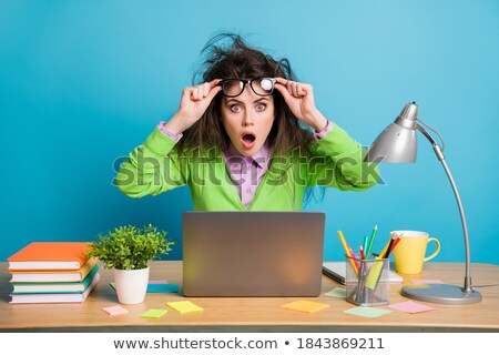 [[stock_photo]]: Woman Open Mouthed In Shock At Her Computer